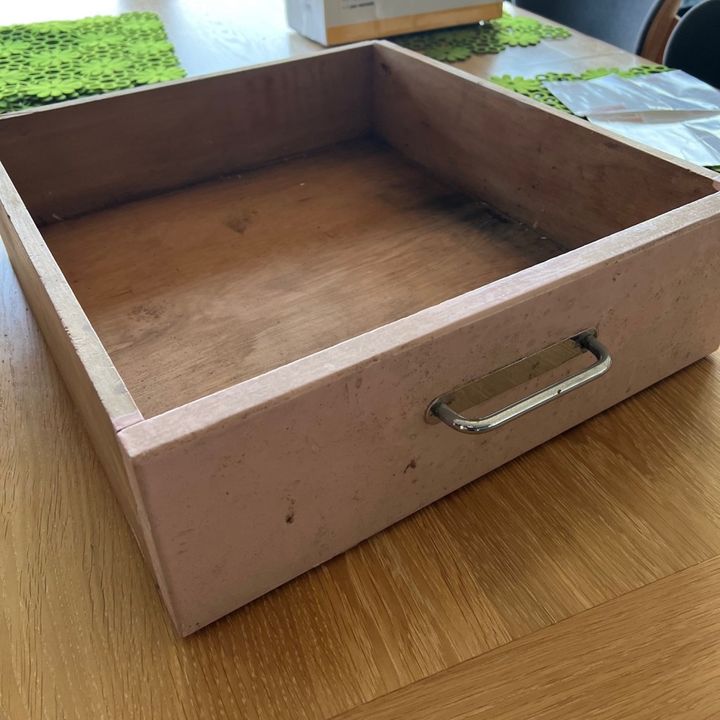 An old kitchen drawer prior to being transformed into a fly tying station.