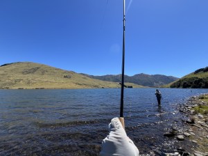 Both rods bending with a double hook-up of trout